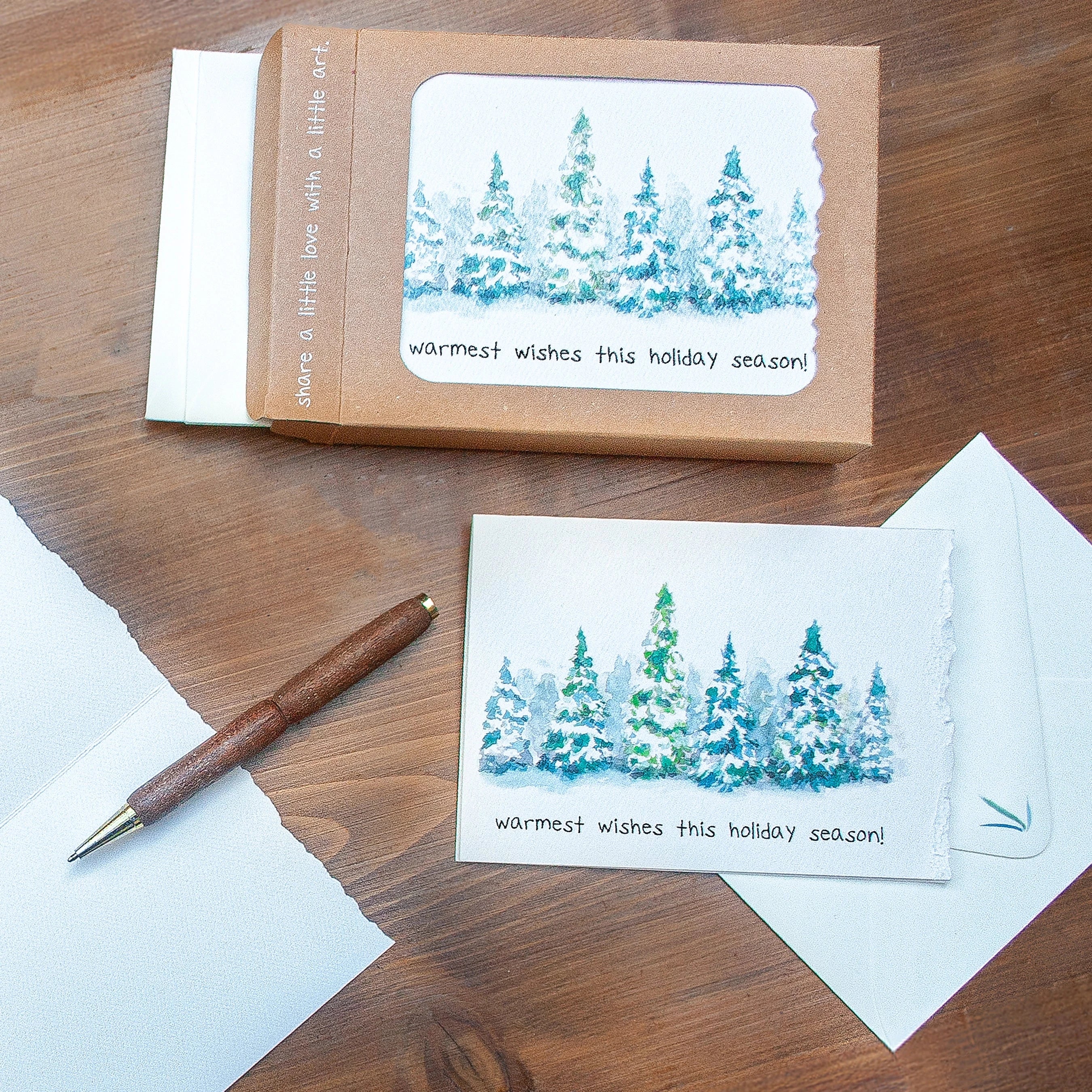 Colorful greeting cards in Kraft boxes arranged side-by-side