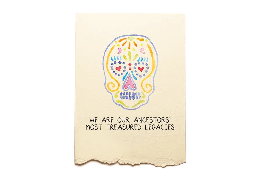 Card with a colorful skull design and text on a beige background