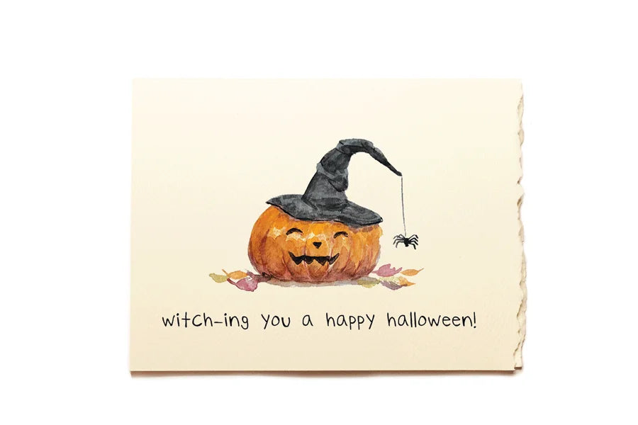 Halloween card with a pumpkin wearing a witch's hat and text 'Witch-ing you a happy Halloween!' on a beige background.