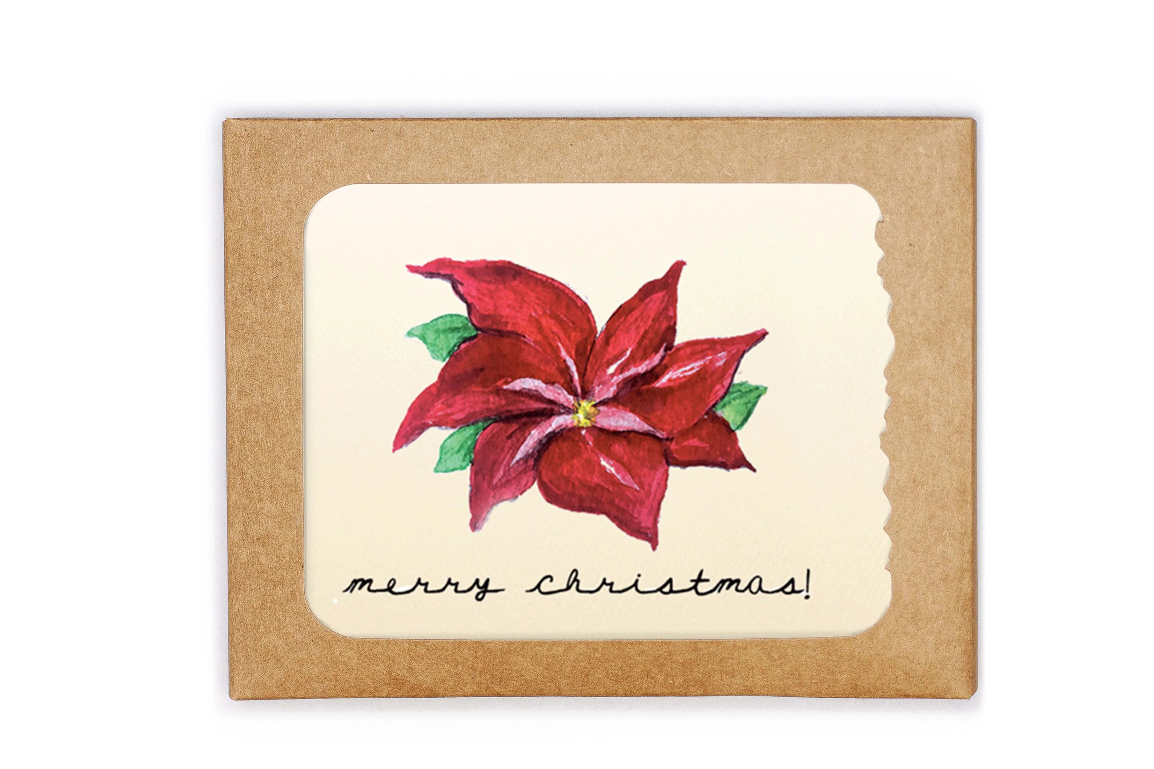 Christmas card with poinsettia design and 'merry Christmas!' text on a kraft paper background.