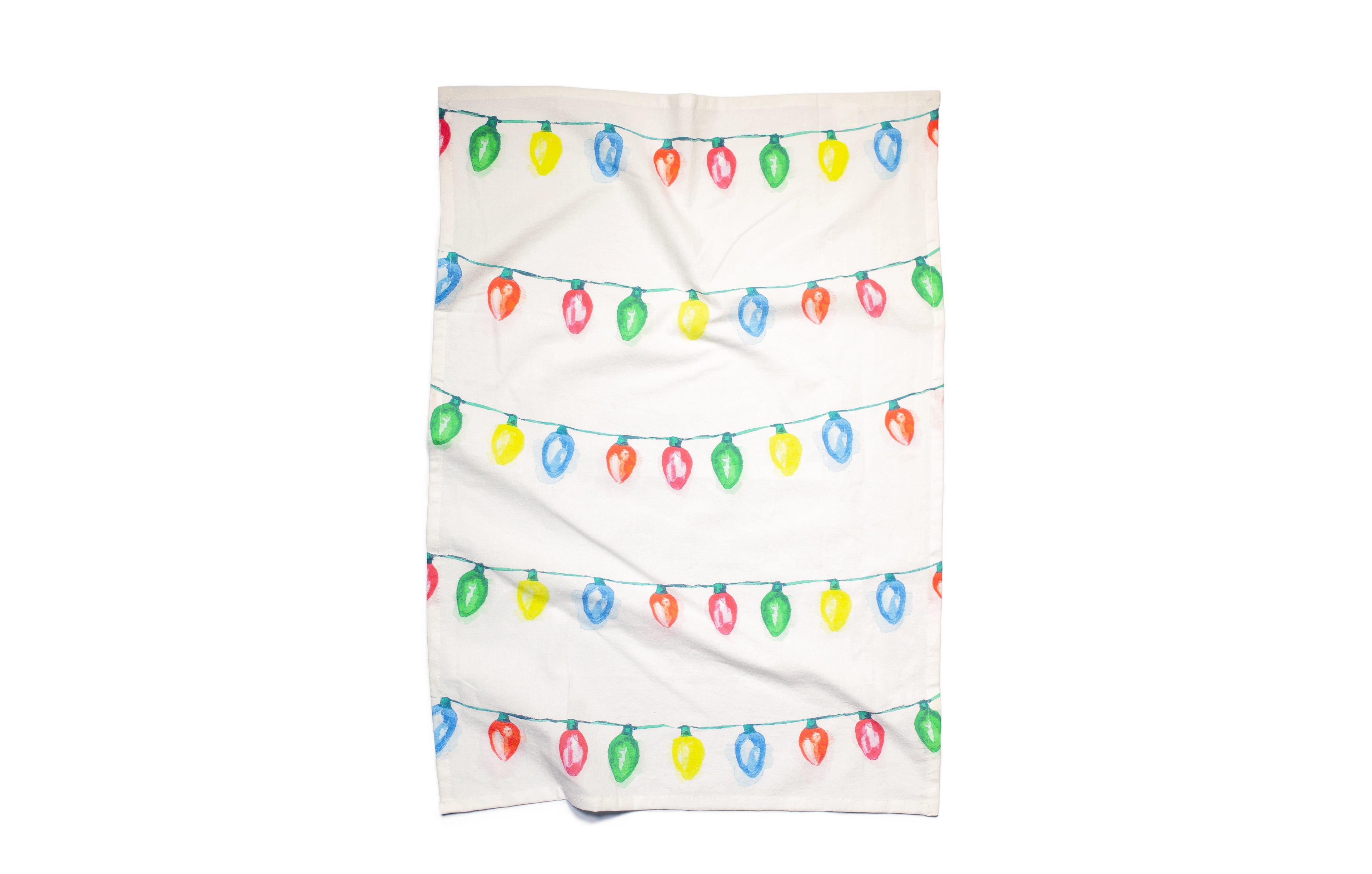 Tea towel with colorful Christmas light design on a white background