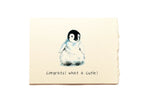 Note card with a penguin illustration and text on a beige background