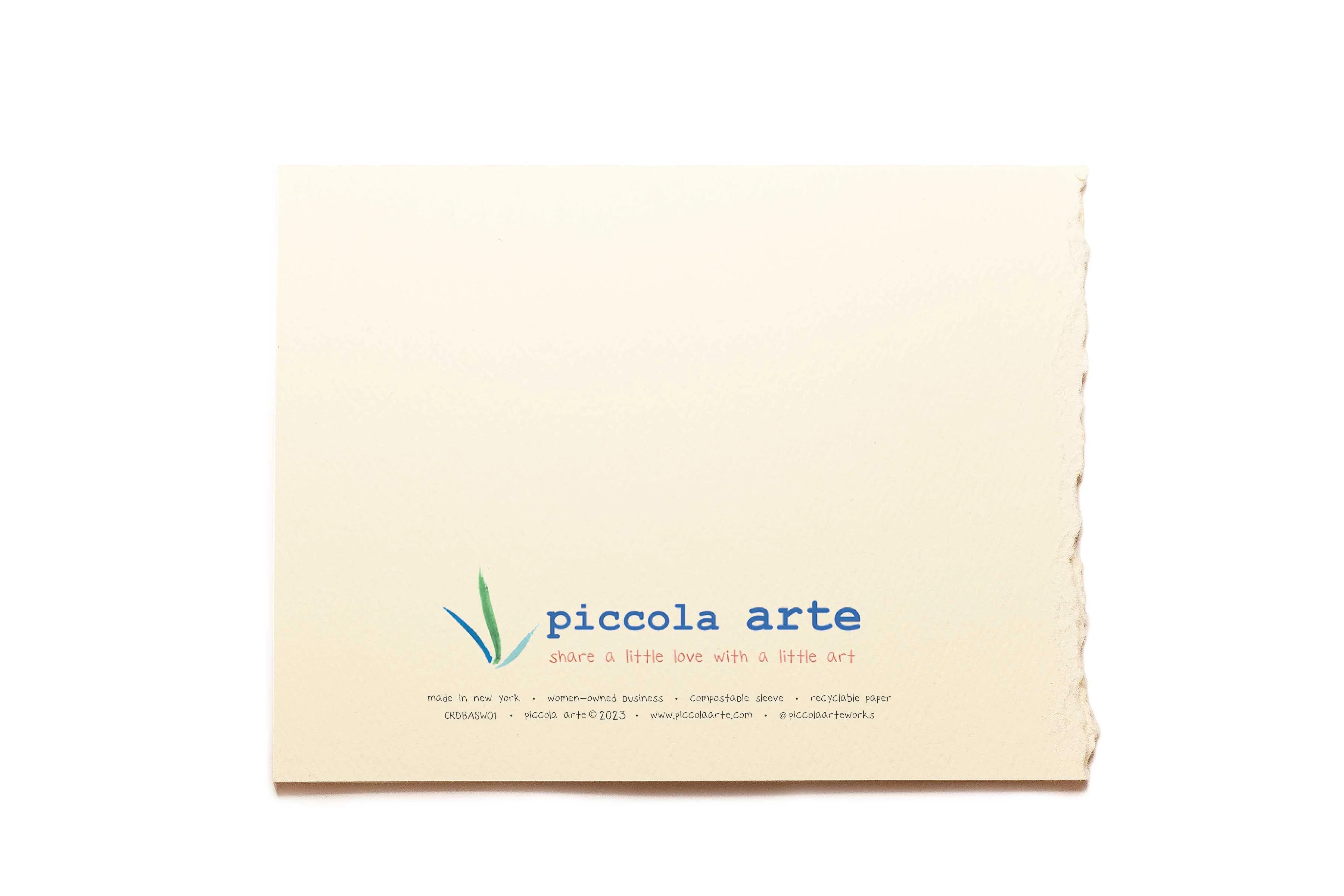 The back of a greeting card from piccola's arte.