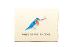 Birthday card with a colorful bird illustration and 'happy birthday to you!' text on a beige background