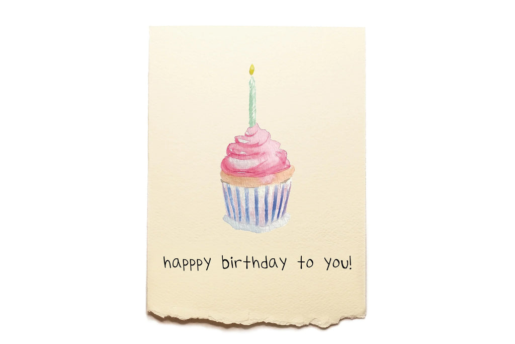Greeting card with a cupcake illustration and 'happy birthday to you!' text on a beige background