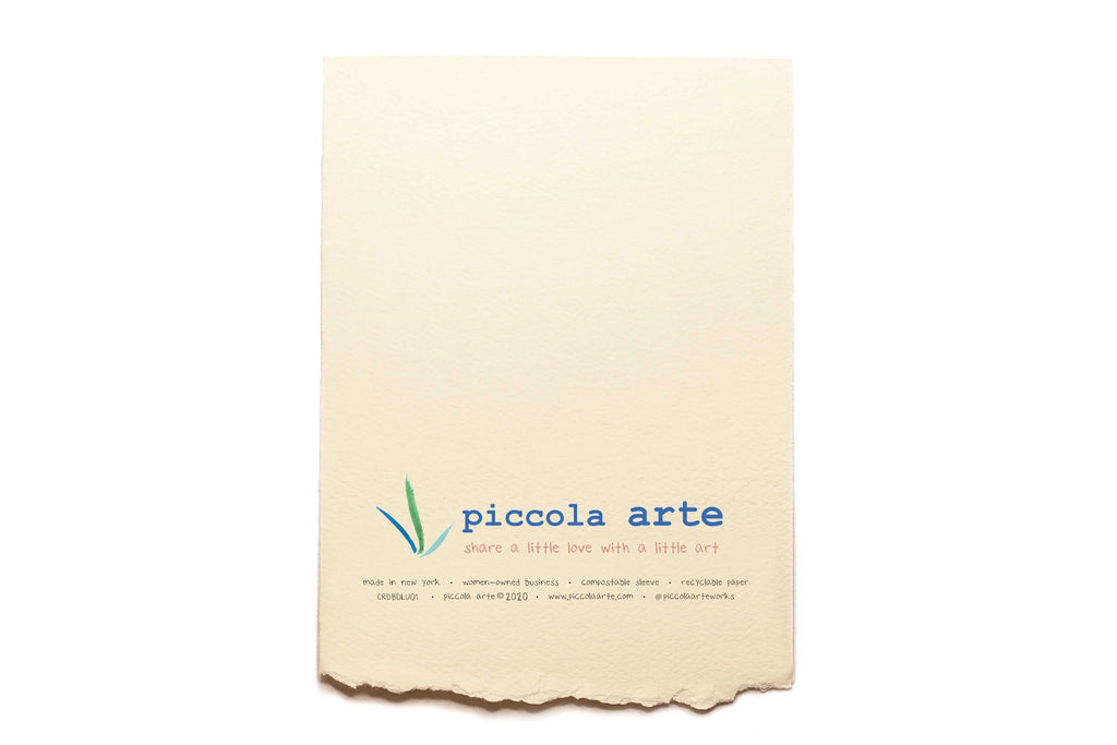 The back of a greeting card from piccola's arte.