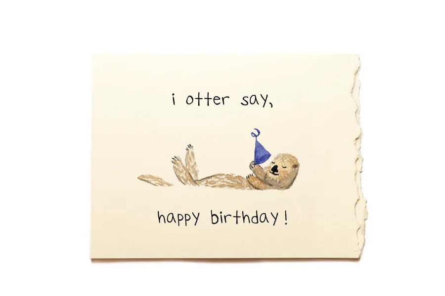 Birthday card with an otter and text 'i otter say, happy birthday!' on a beige background