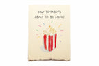 Birthday card with popcorn illustration and text 'your birthday's about to poppin!' on a beige background