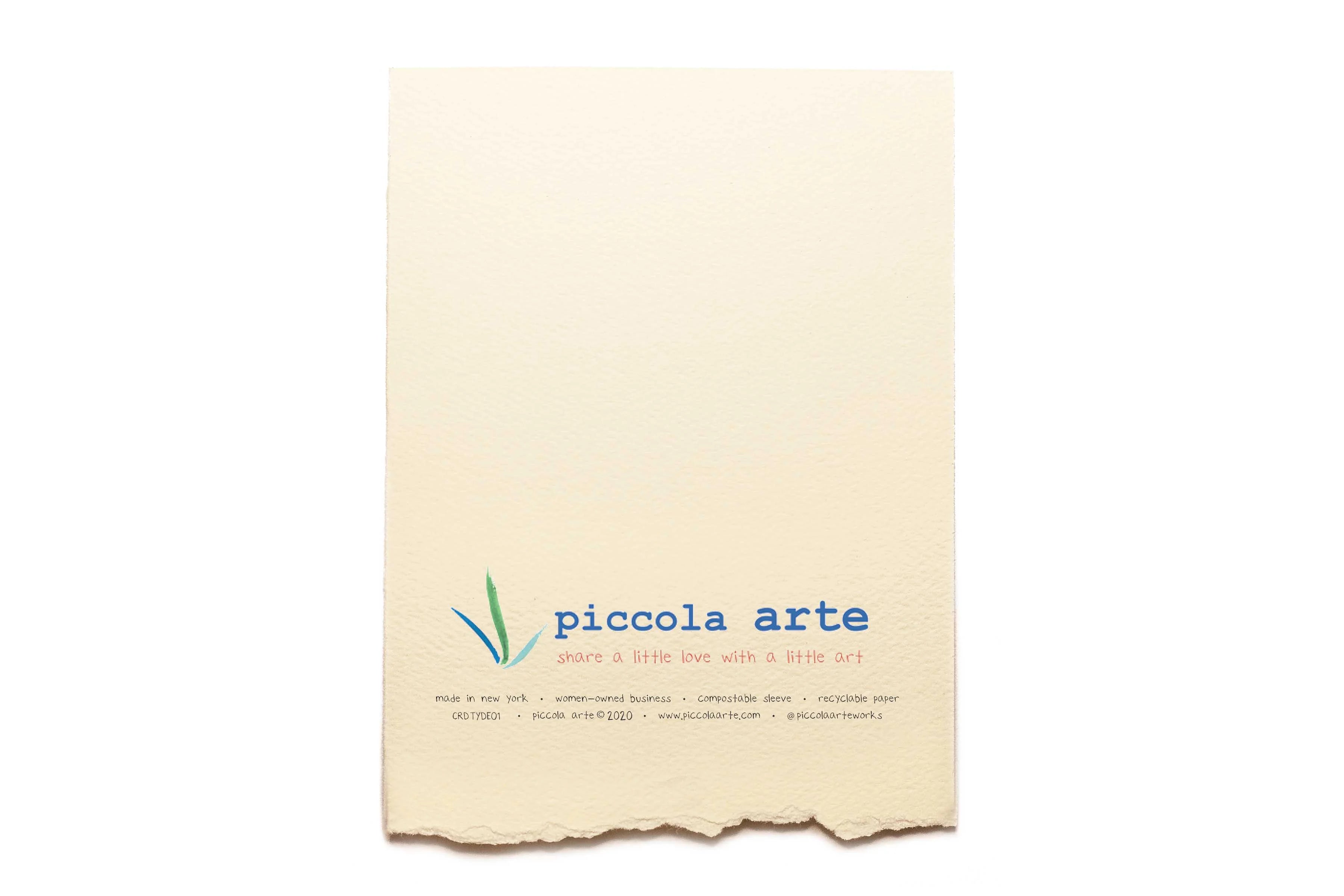 The back of a greeting card from piccola's arte.