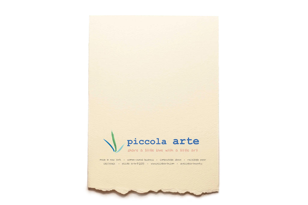 The back of a greeting card from piccola's arte.