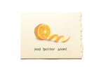 Note with an orange slice and text 'peel better soon!' on a white background