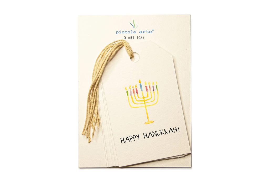 Pack of gift tags with Menorah design and 'Happy Hanukkah!' text on a white background