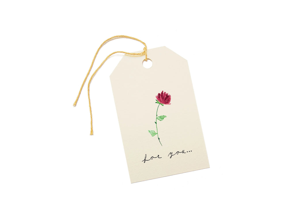 Gift tag with a red flower illustration and 'love you' text on a white background.