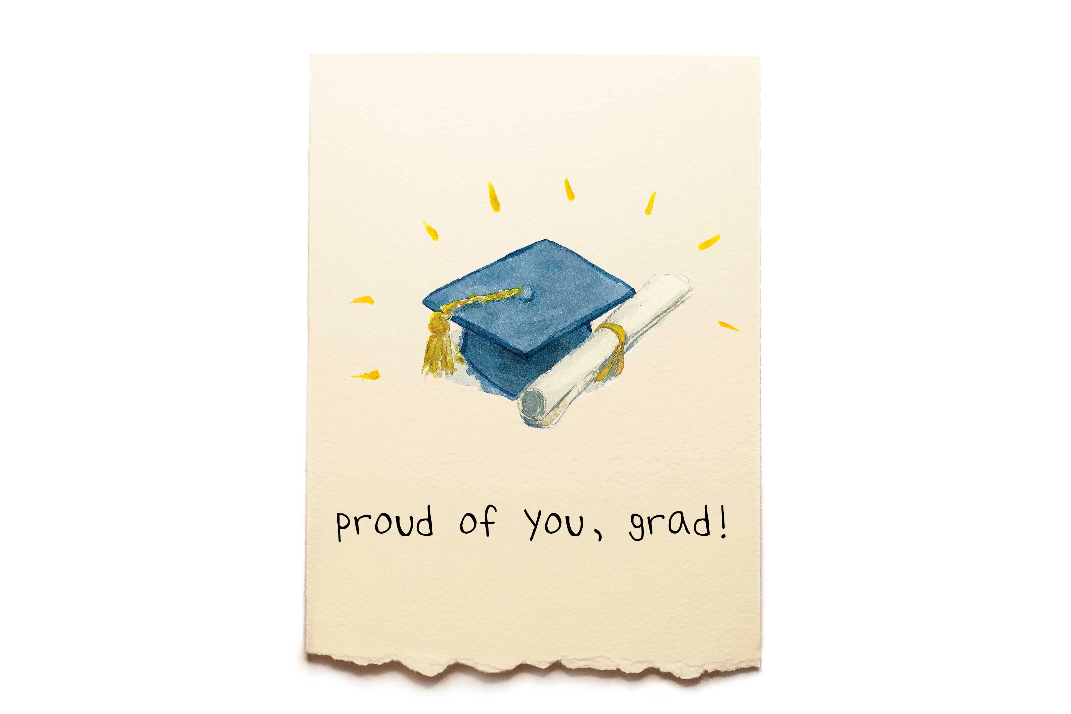 Graduation-themed card with a blue cap and diploma on a beige background with 'proud of you, grad!' text.