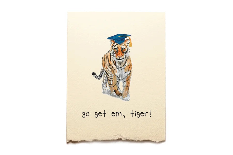 Graduation-themed greeting card with a tiger wearing a cap and 'go get em, tiger!' text on a beige background.