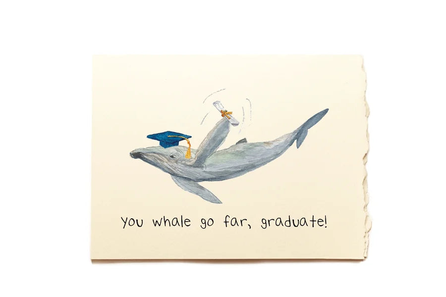 Graduation card with a whale carrying a graduate in a blue cap and gown on a beige background.