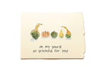 Note card with gourd illustrations and text on a white background