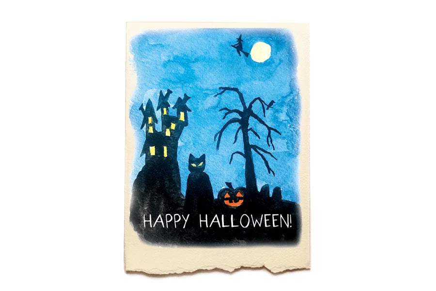 Halloween-themed card with a blue sky, moon, black cat, and pumpkin on a white background.