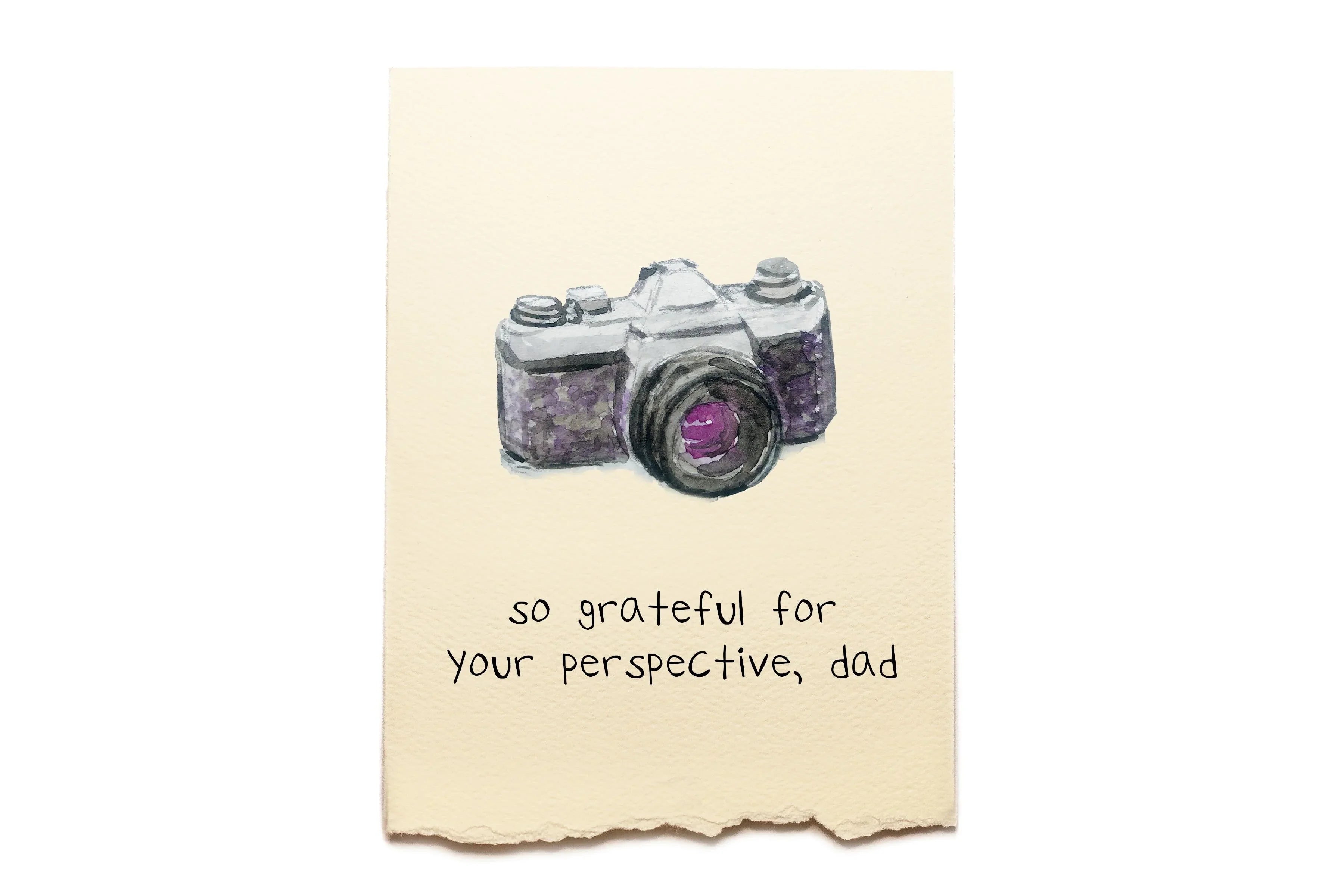 Note with a camera illustration and text on a beige background