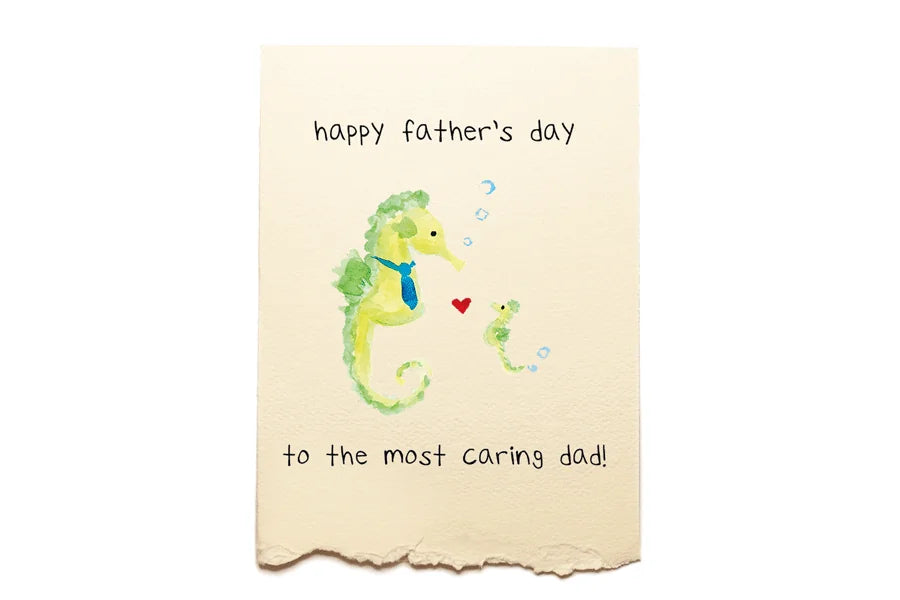 Father's Day card with a seahorse illustration and text on a beige background