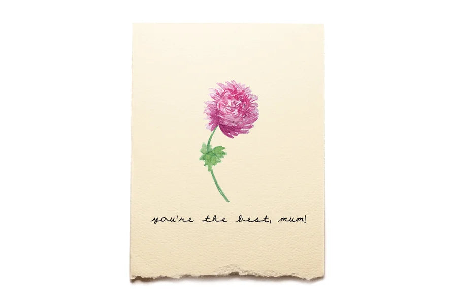 Notebook with a pink flower illustration and 'you're the best, mum' text on a beige background