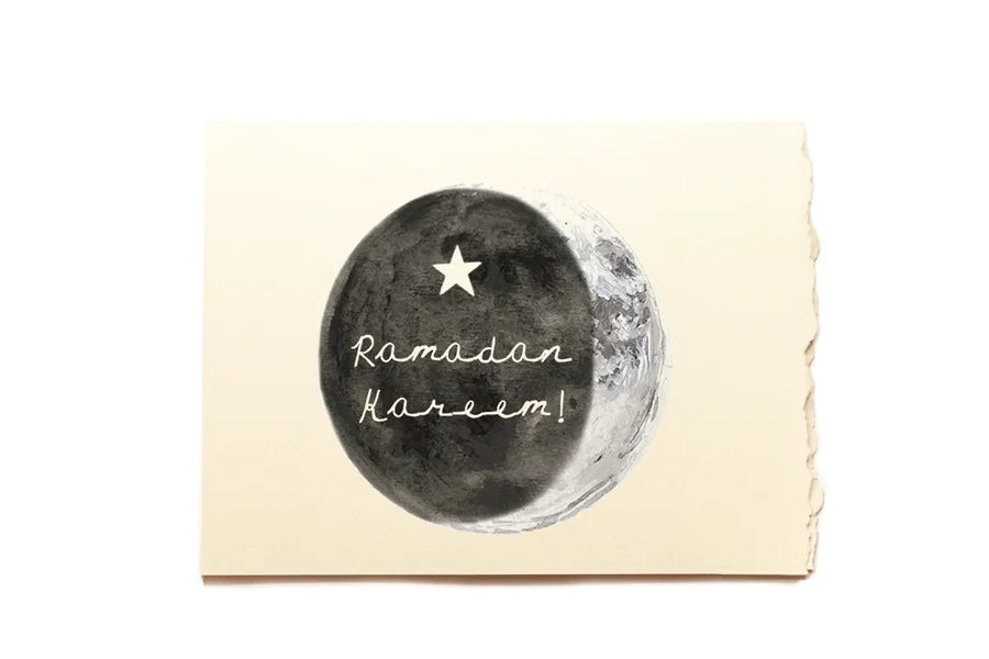 Card with a moon and star design and 'Ramadan Kareem!' text on a beige background