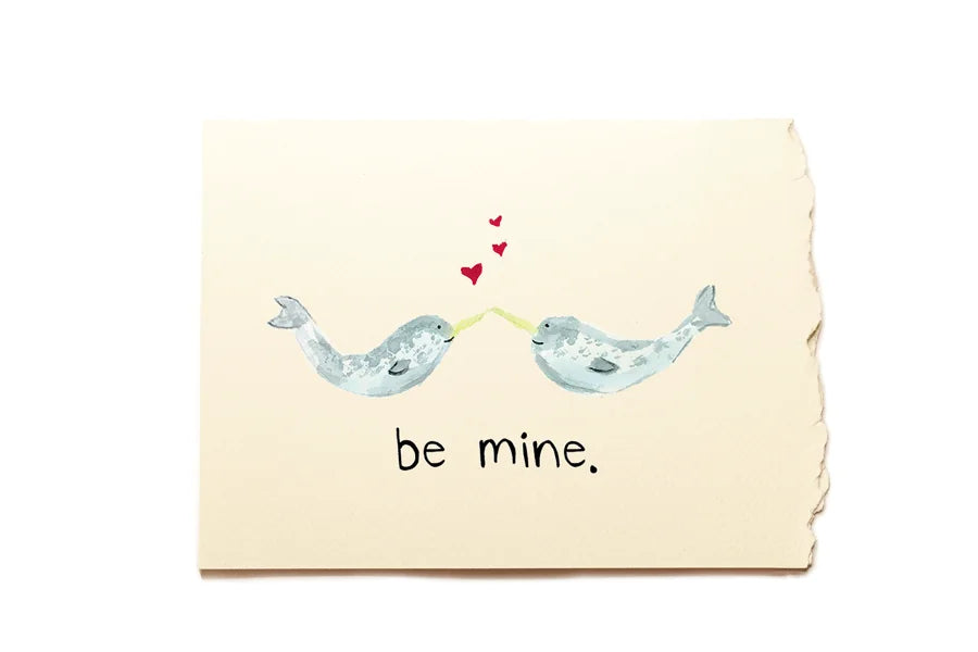 Card with two whales holding hands and hearts, with 'be mine' text on a beige background
