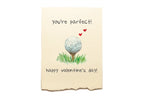 Valentine's Day card with golf ball on tee and text 'You're perfect! Happy Valentine's Day!'
