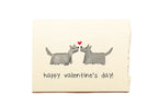 Valentine's Day card with two dogs and a heart on a beige background