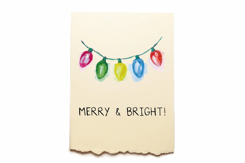 Card with colorful Christmas lights and 'Merry & Bright!' text on a beige background