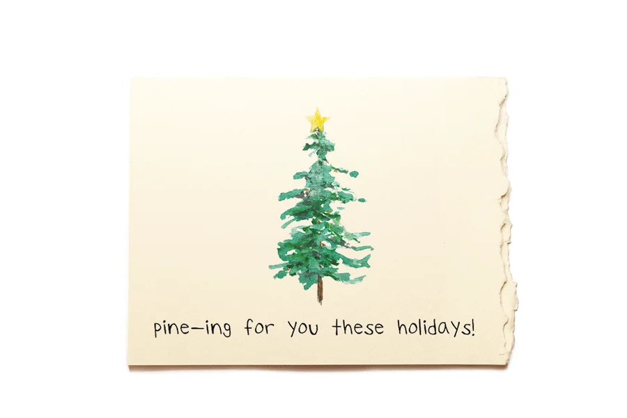 Card with a Christmas tree illustration and text on a beige background