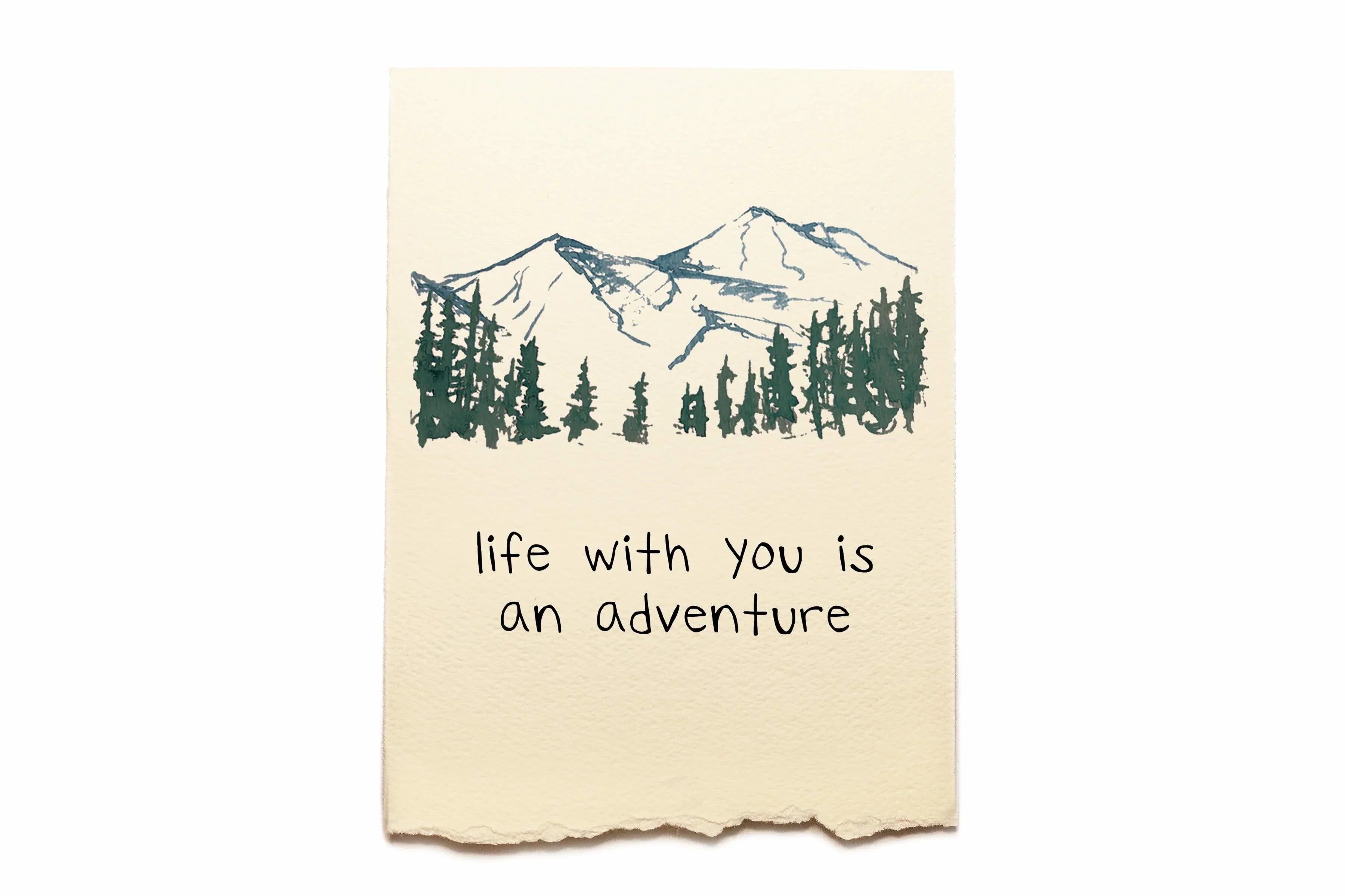 Paper with mountain and tree illustration and 'life with you is an adventure' text on a white background