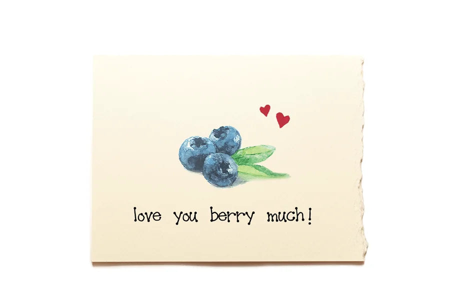 Card with blueberries and hearts illustration and 'love you berry much!' text on a beige background