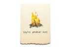 Handkerchief with a campfire illustration and text 'you're smokin' hot!' on a white background
