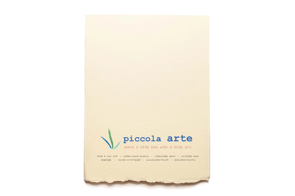 The back of a greeting card from piccola's arte.
