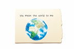 Note with Earth illustration and 'you mean the world to me' text on a white background