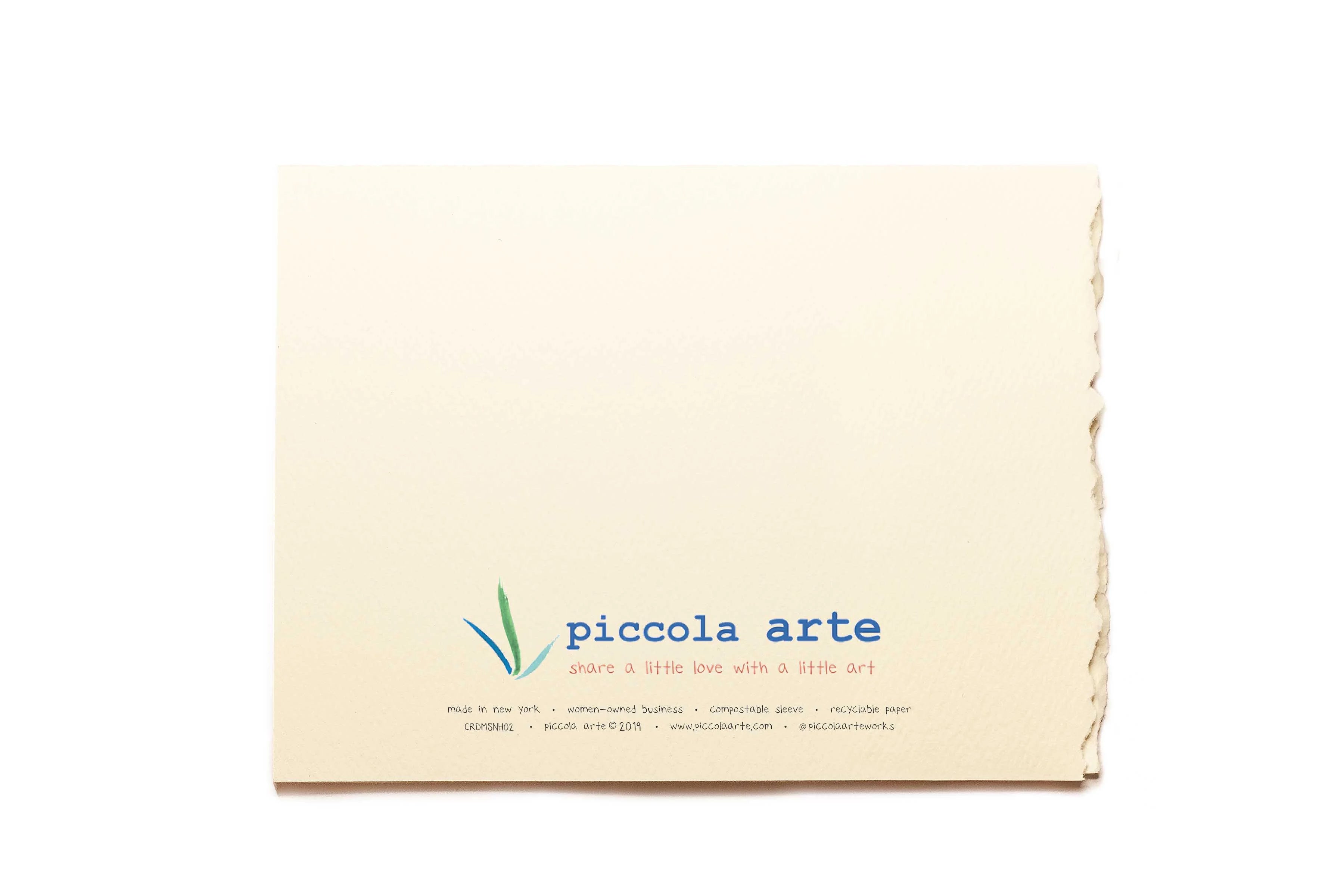 The back of a greeting card from piccola's arte.