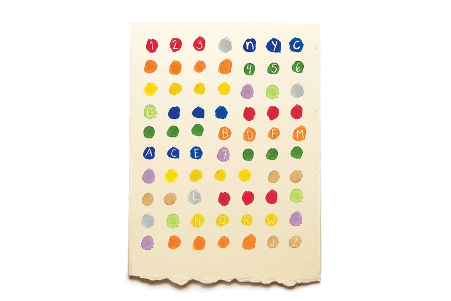 Colorful polka dot pattern on a beige background