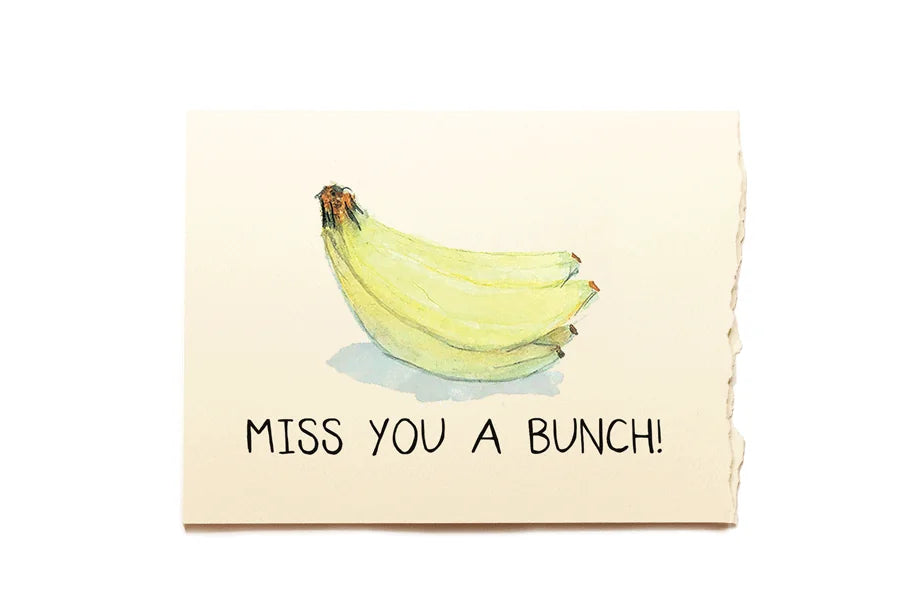 Card with a bunch of bananas and text 'Miss You A Bunch!' on a beige background