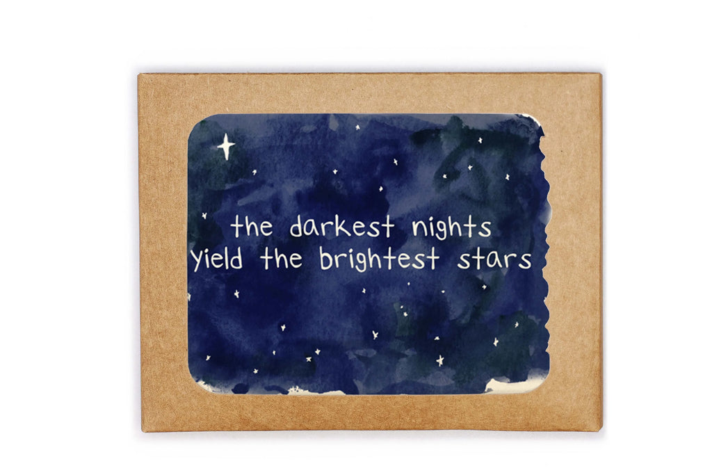 Card with starry night design and motivational quote on a white background