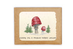 Greeting card with mushrooms and trees on a kraft paper background