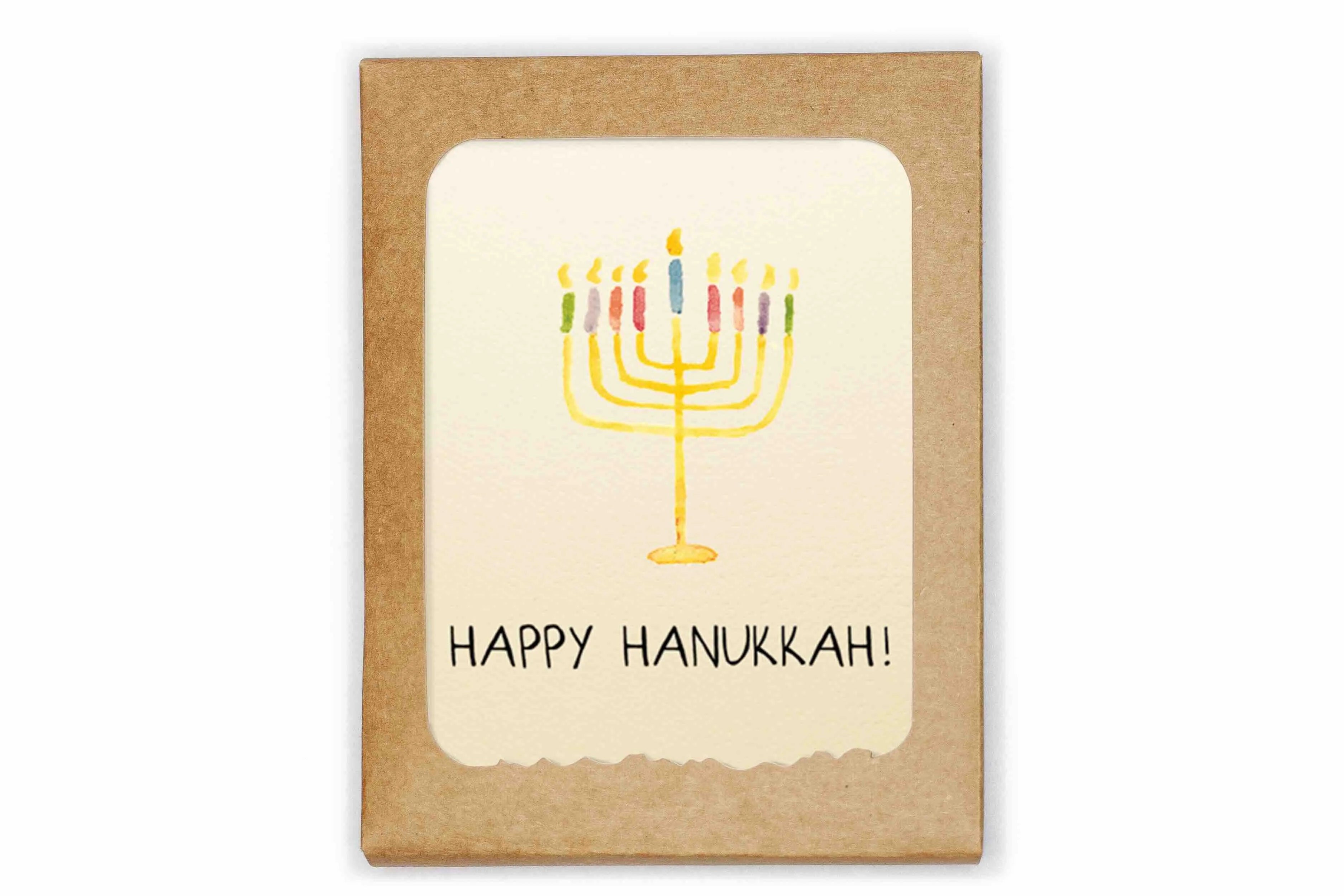 Card with a colorful menorah and 'Happy Hanukkah!' text on a kraft paper background