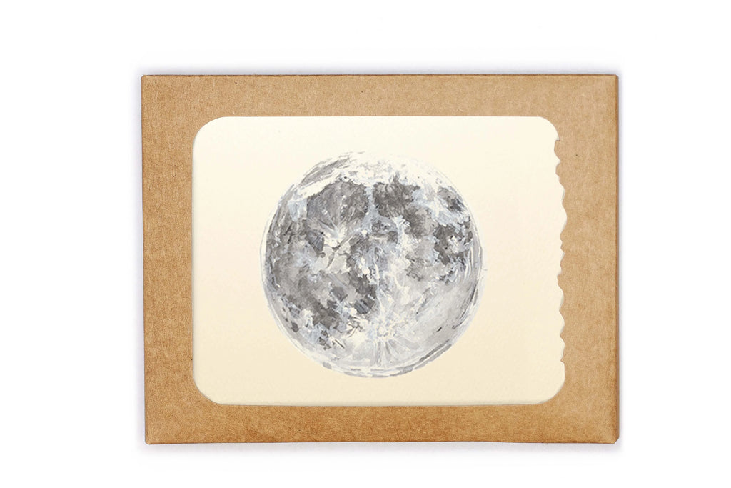 Framed print of a moon illustration on a beige background
