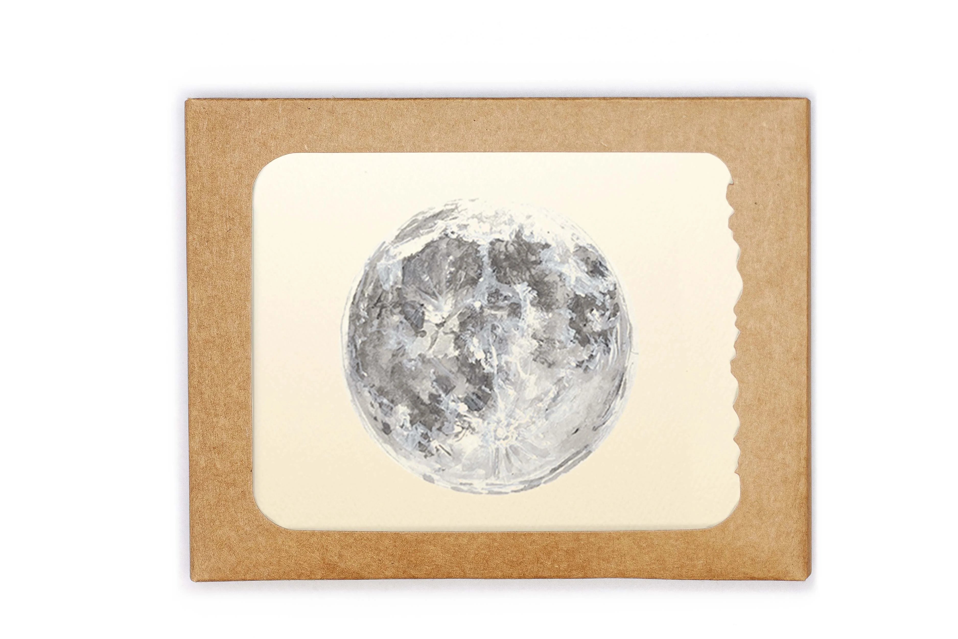 Framed print of a moon illustration on a beige background