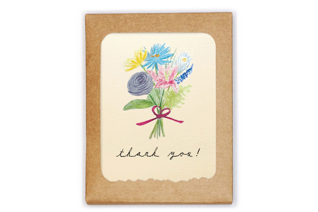 Card with floral design and 'thank you!' text on a white background