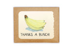 Card with a banana illustration and 'Thanks a Bunch!' text on a kraft paper background