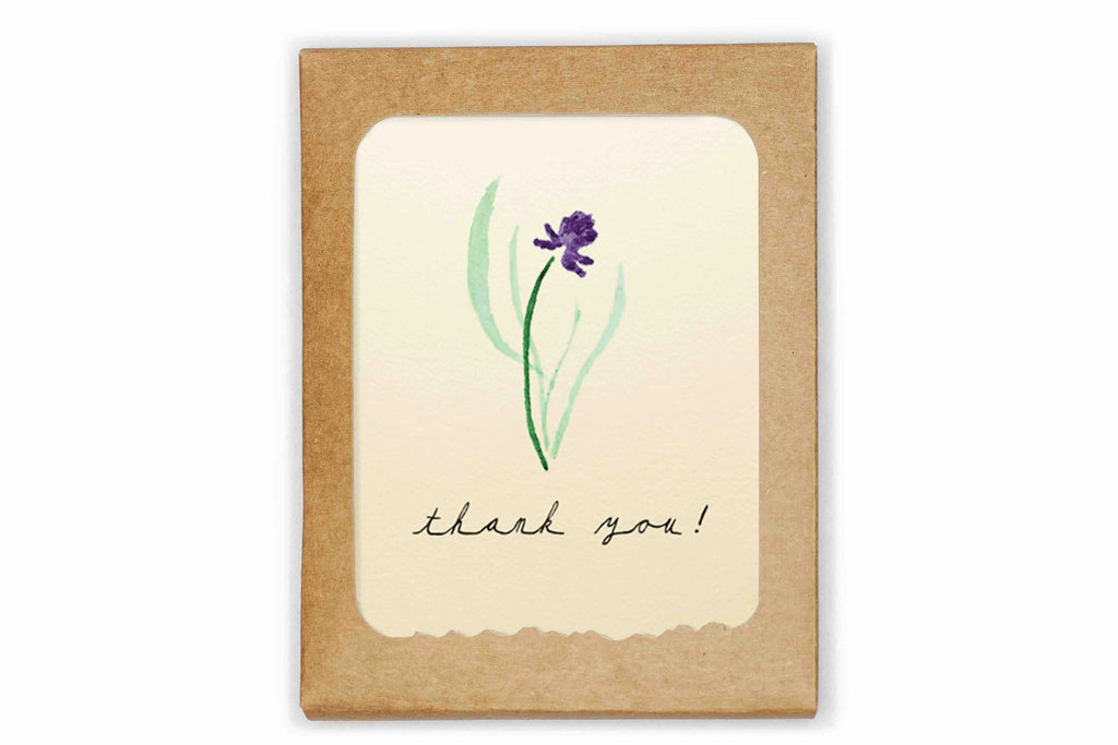 Card with a purple flower illustration and 'thank you!' text on a beige background