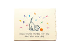 Greeting card with a dog illustration and colorful text on a white background