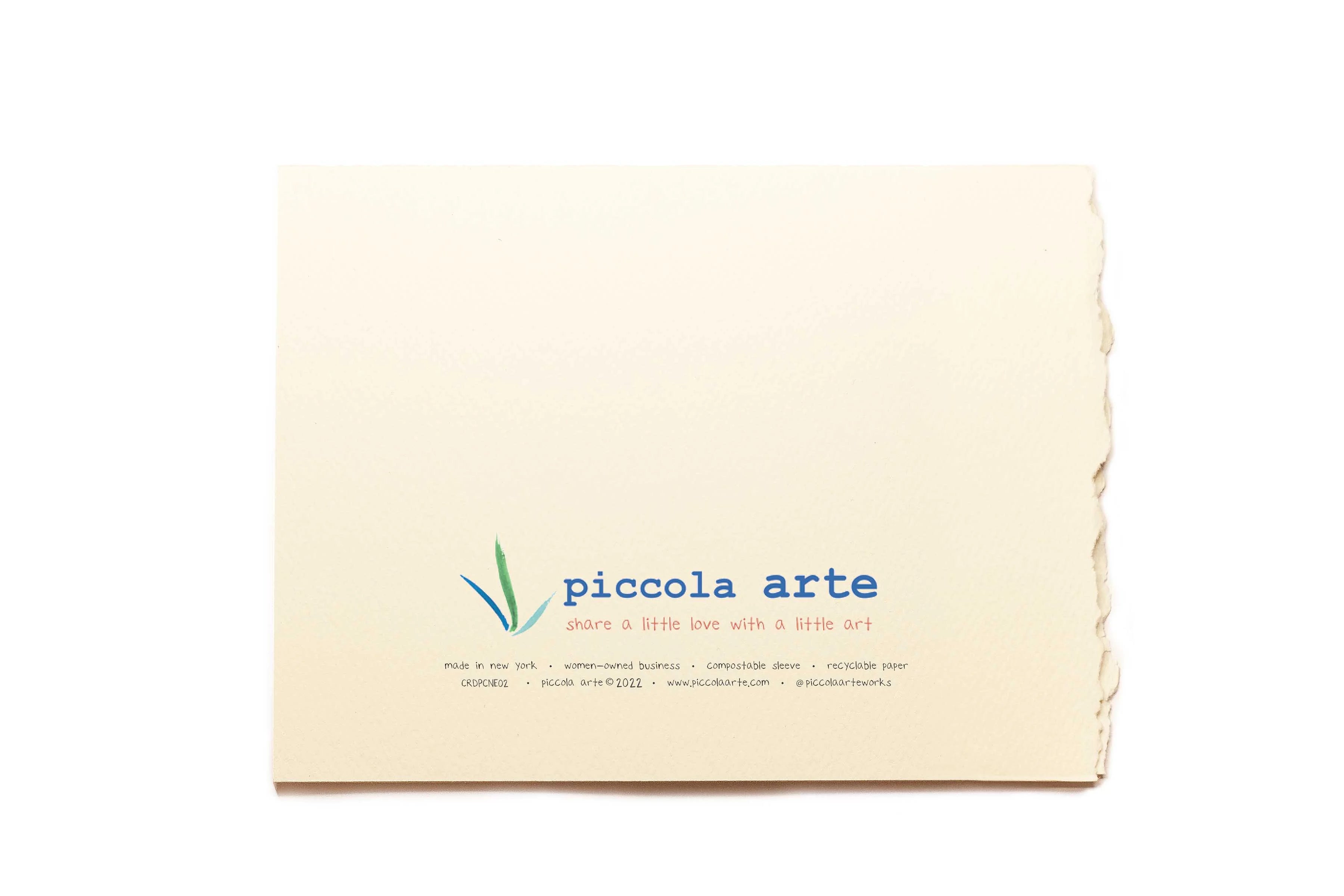 The back of a greeting card from piccola's arte.