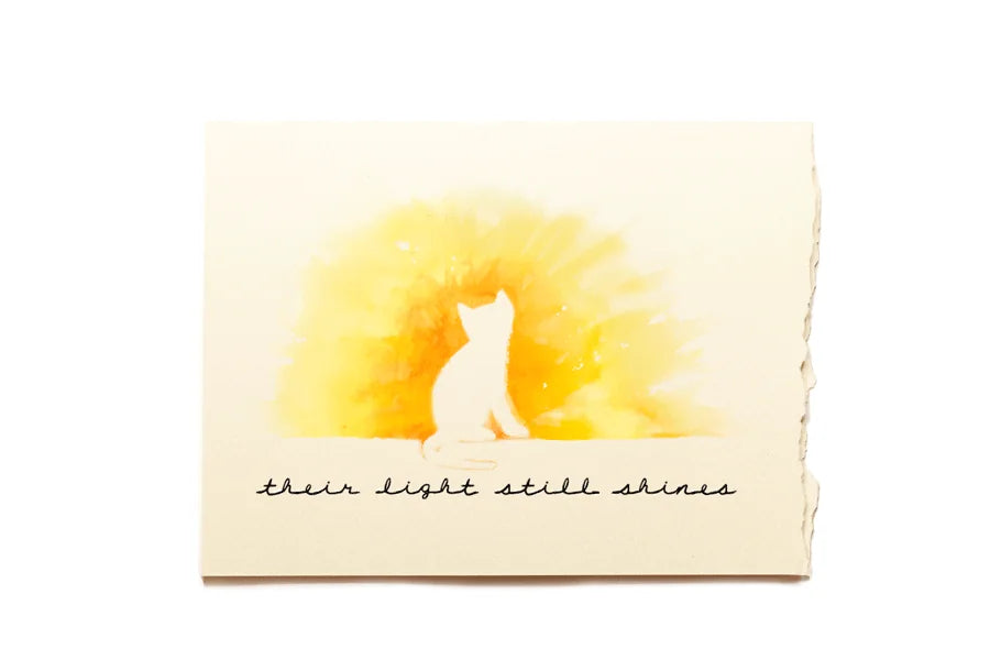 Note card with a watercolor illustration of a cat and text on a white background
